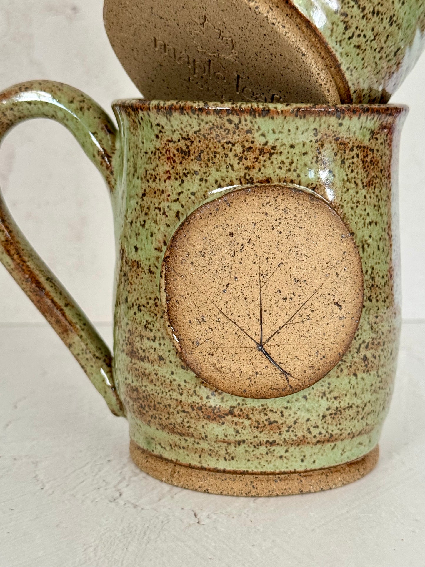 Maple Leaf Mug in Light Green Shino