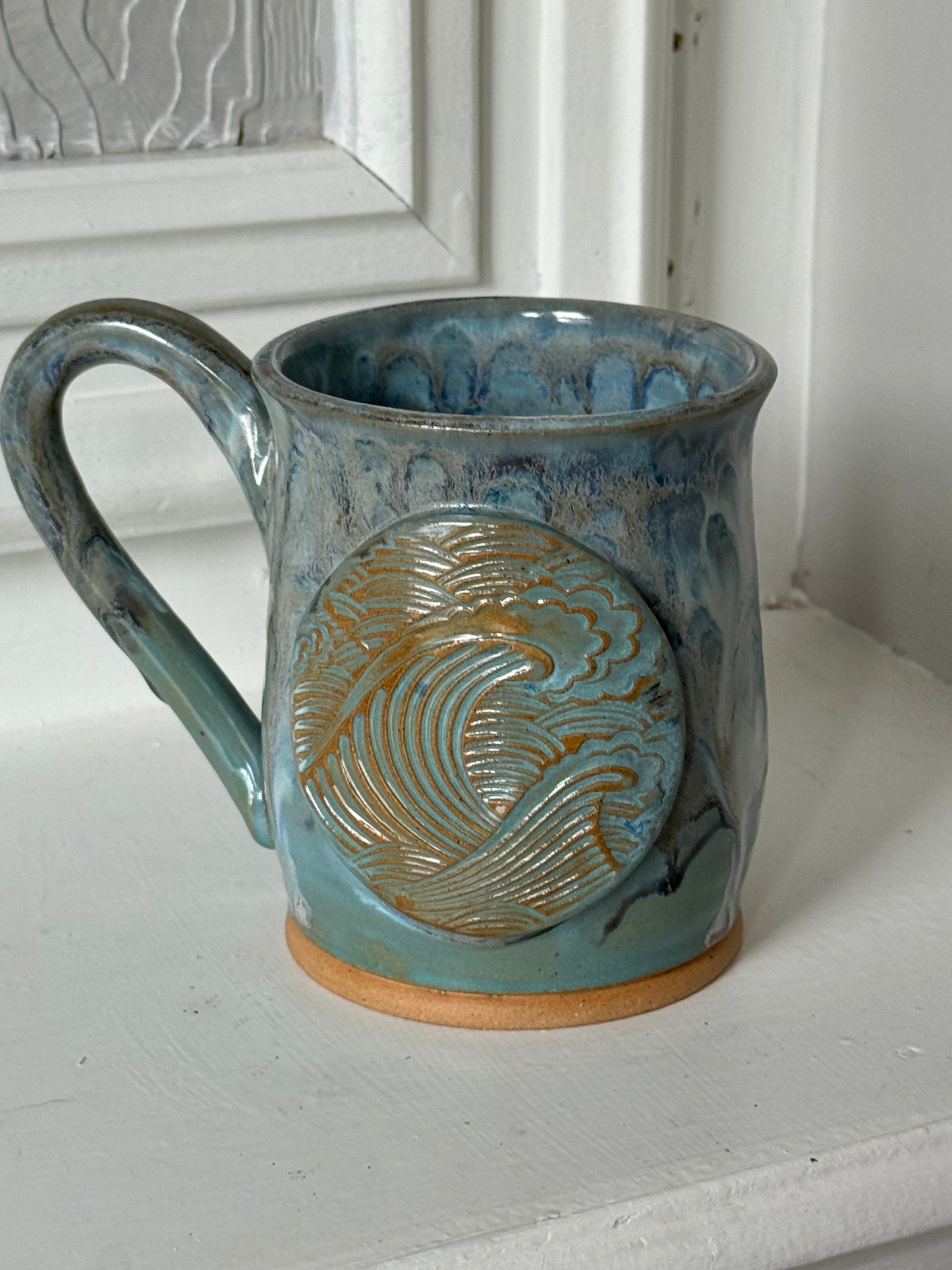 Lost at Sea Wave Mug on Tan and White Clay body